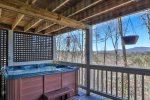 Enjoy mountain views while relaxing in the hottub
